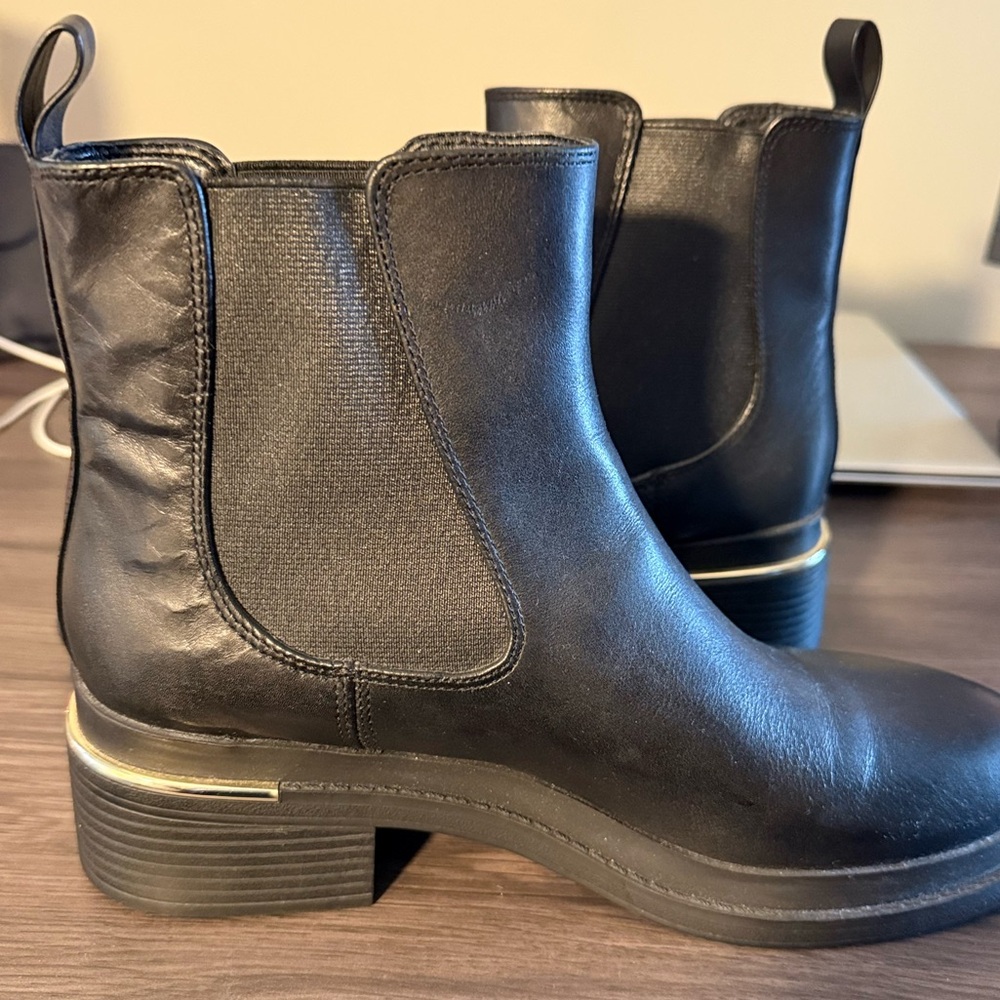 Never Worn! Kenneth Cole size 7.5 Black leather boots with gold accents.